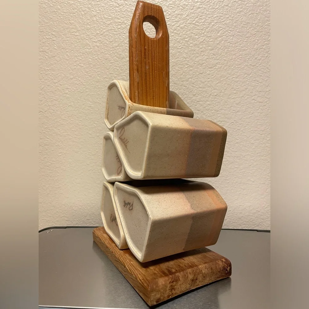 Rodolfo Padilla stacking mugs
